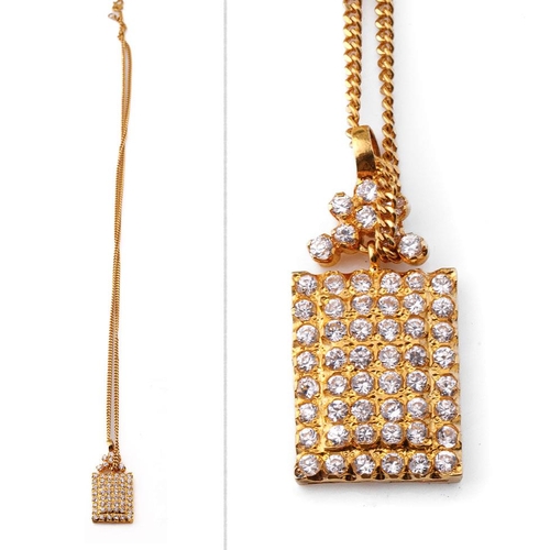 22ct gold chain and pendant set with white sapphires, 11.5 grams, chain 49cm long.