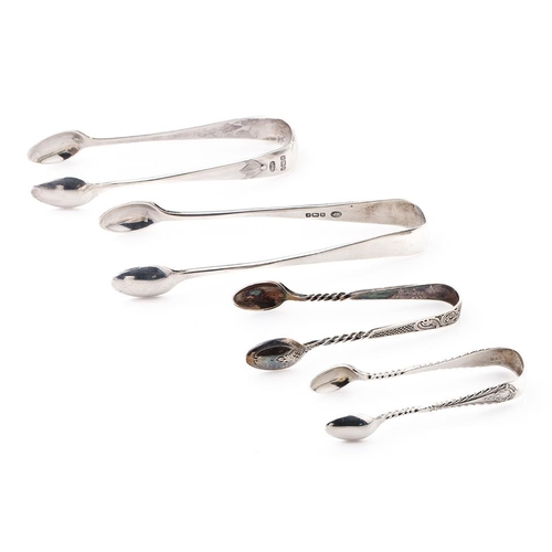 71 - A collection of hallmarked silver sugar tongs to include a plain pair and others with ornate designs... 