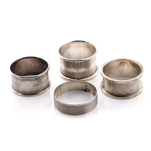 78 - A selection of silver napkin rings to include Rolason Brothers Birmingham 1924, Hazlewoods Birmingha... 