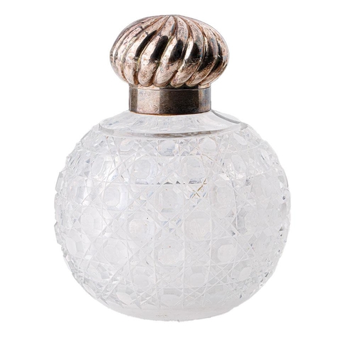 83 - Silver topped cut glass globular scent bottle with swirl decoration lid, Birmingham 1889, with stopp... 