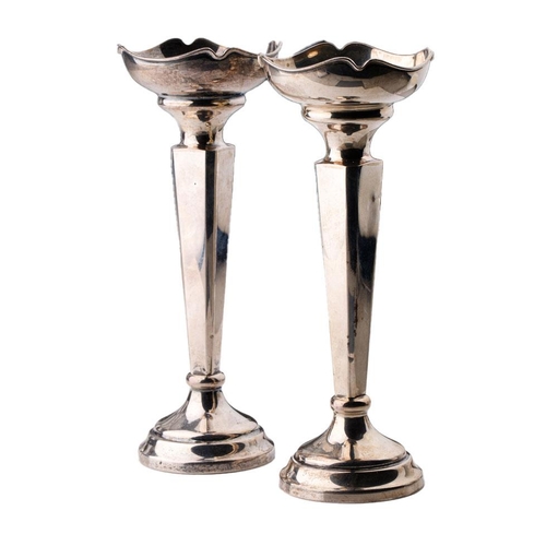 84 - A pair of hallmarked silver vases with shaped rims, Birmingham 1917, Sanders and MacZenzie, 18cm tal... 