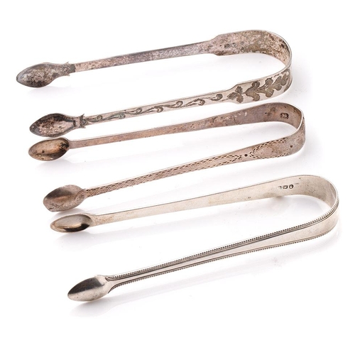 97 - A trio of silver sugar tongs to include 2 Georgian pair and one similar, 102.1 grams (3).