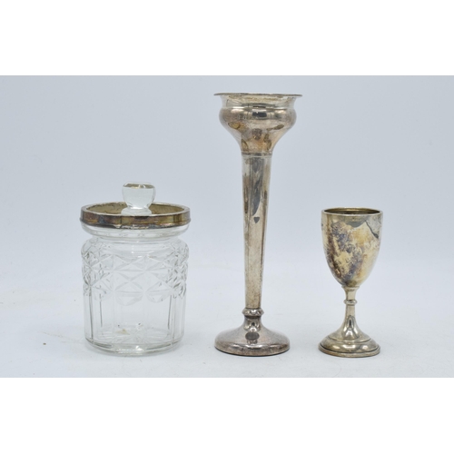 103 - A trio of silver items to include small chalice, Birmingham 1931, 28.6 grams, a loaded silver vase, ... 