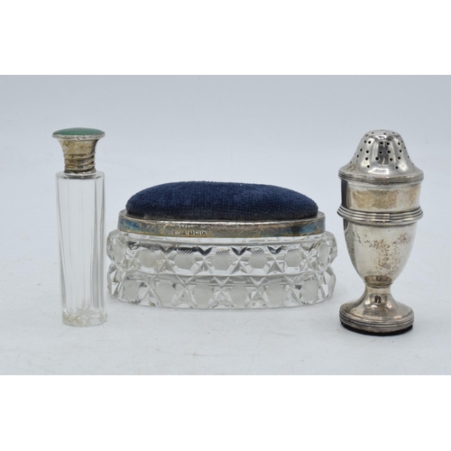 104 - A trio of silver items to include a pin cushion trinket box, Birmingham 1927, a Guilloche enamel sce... 