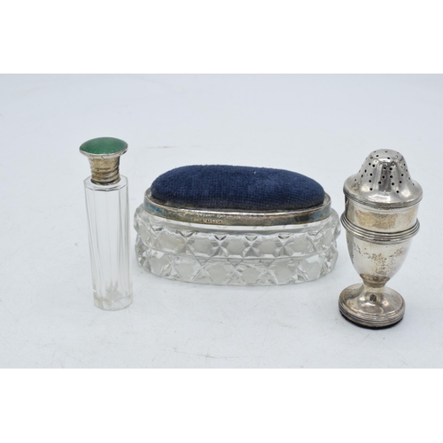 104 - A trio of silver items to include a pin cushion trinket box, Birmingham 1927, a Guilloche enamel sce... 