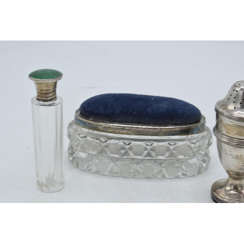 104 - A trio of silver items to include a pin cushion trinket box, Birmingham 1927, a Guilloche enamel sce... 