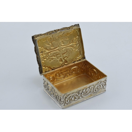 108 - A pair of silver trinket boxes, both with embossed decoration, the larger being Birmingham 1900, the... 