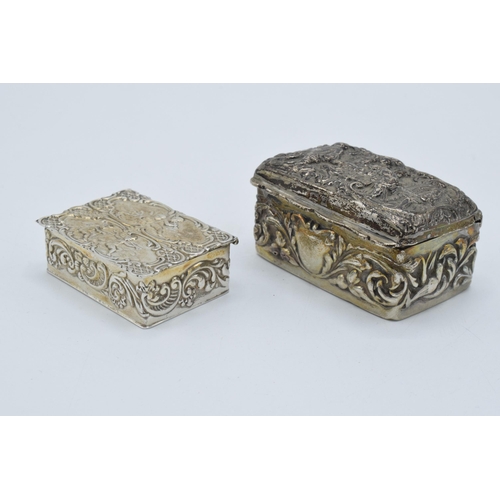 108 - A pair of silver trinket boxes, both with embossed decoration, the larger being Birmingham 1900, the... 