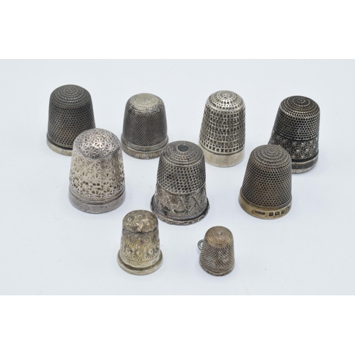 112 - A collection of silver thimbles to include examples by Charles Horner and others (9), 37.4 grams.