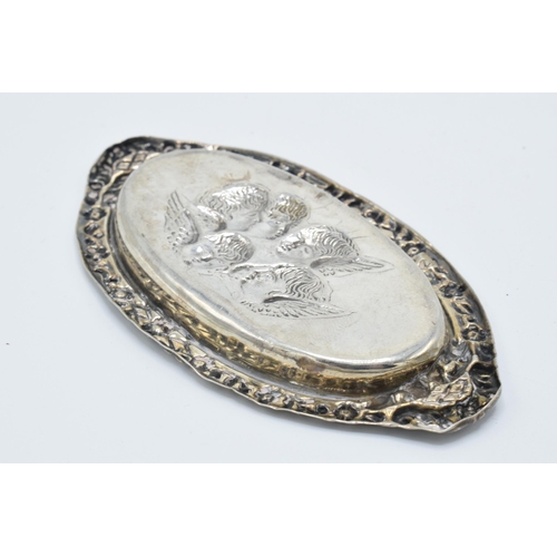 116 - A pair of silver items in the Reynold's Angel pattern to include a small oval pin tray, Birmingham 1... 