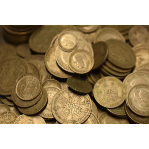 12 - A large collection of 1920-1946 silver coinage of varying denominations, approx 1040+ grams.