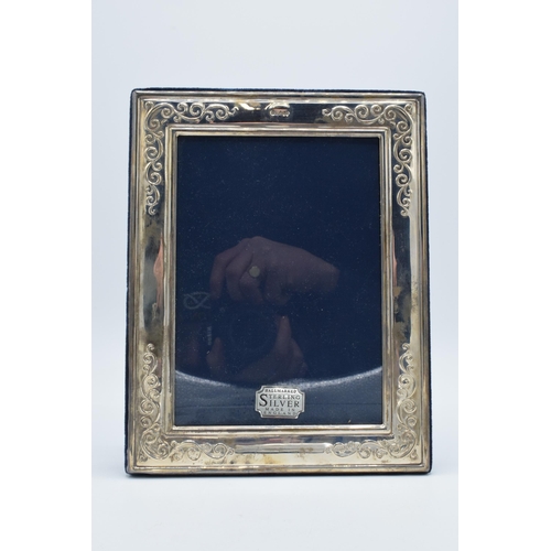 121 - Hallmarked silver easel-backed photo frame, 22cmx18cm, Sheffield 1993.