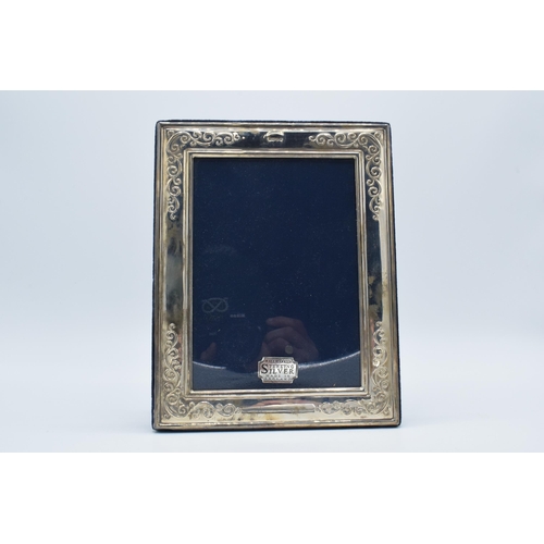 121 - Hallmarked silver easel-backed photo frame, 22cmx18cm, Sheffield 1993.