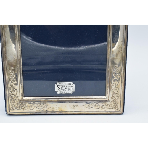 121 - Hallmarked silver easel-backed photo frame, 22cmx18cm, Sheffield 1993.