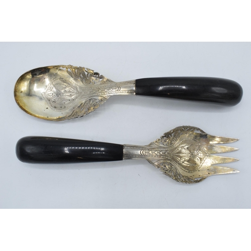 124 - A pair of early to mid 20th century lower grade silver salad servers with ebonised wooden handles, M... 