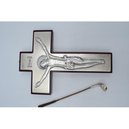 130 - A silver fronted INRI crucifix scene of Jesus on his cross together a novelty golf club with silver ... 