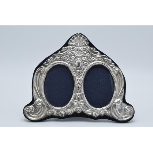 133 - Hallmarked silver fronted double photo frame, 18cm wide, Birmingham 1995.