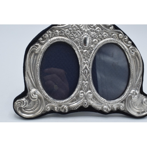 133 - Hallmarked silver fronted double photo frame, 18cm wide, Birmingham 1995.