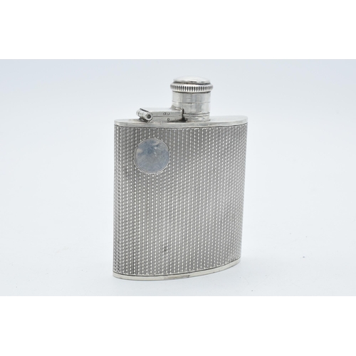 134 - Hallmarked silver hip flask with engineered decoration and vacant cartouche, 78.7 grams, 'Cambridge ... 