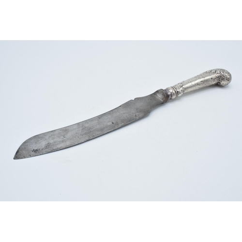 141 - Large silver handled carving knife, 34cm long hallmarks rubbed.