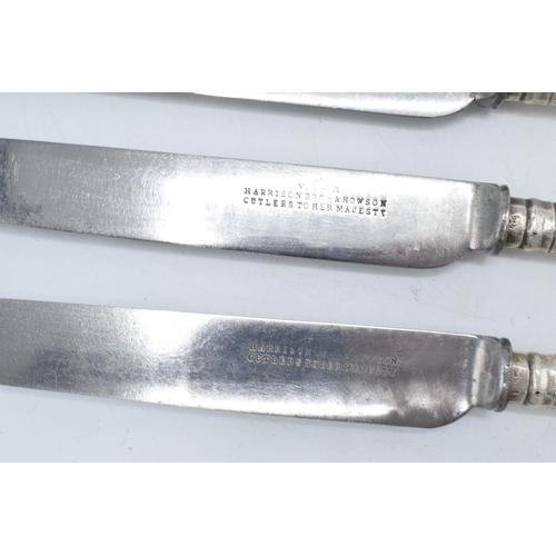 144 - A set of 6 silver handled knives, 'Harrison Bros & Howson', 23cm long, hallmarks rubbed (6).