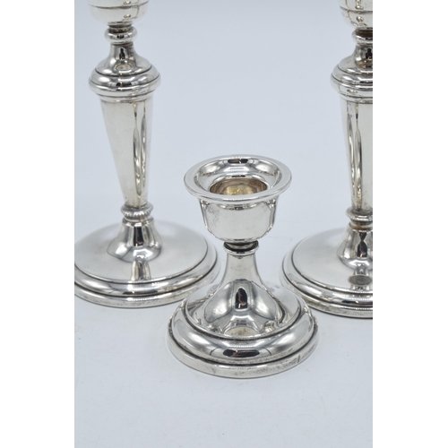 156 - A near pair of hallmarked silver candlesticks, made by W I Broadway & Co, Birmingham 1984 and 1989, ... 