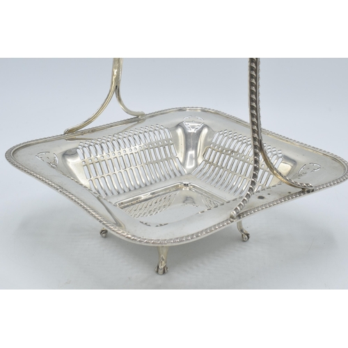 158 - Silver basket with ornate handle and pierced decoration, London 1925, Goldsmiths & Silversmiths, 442... 