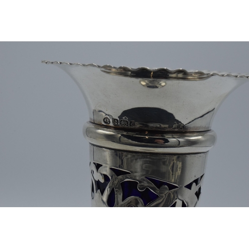 159 - Silver bud vase with pierced decoration and blue glass liner, Birmingham 1903, A. Clark, 19.5cm tall... 