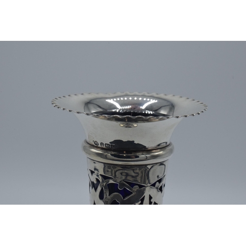 159 - Silver bud vase with pierced decoration and blue glass liner, Birmingham 1903, A. Clark, 19.5cm tall... 