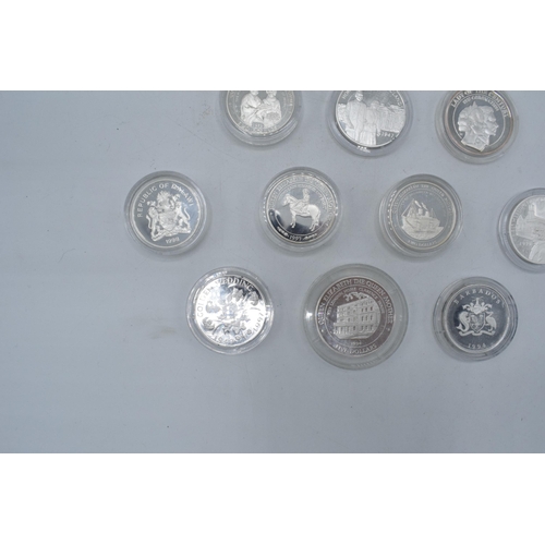 16 - A collection of sterling silver proof coins of various denominations to include Fiji 5 Dollars, Mala... 