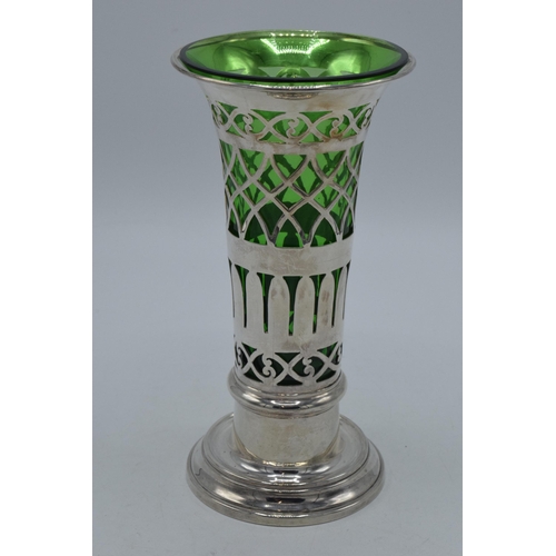 160 - Silver vase with ornate decoration and green glass liner, London 1899, Goldsmiths and Silversmiths, ... 