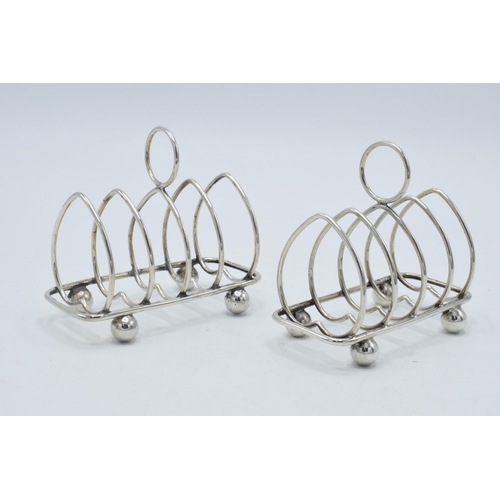 169 - A pair of silver heart-shaped toast racks with room for 4 slices, both Sheffield 1891, Walker and Ha... 