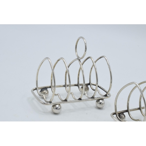 169 - A pair of silver heart-shaped toast racks with room for 4 slices, both Sheffield 1891, Walker and Ha... 