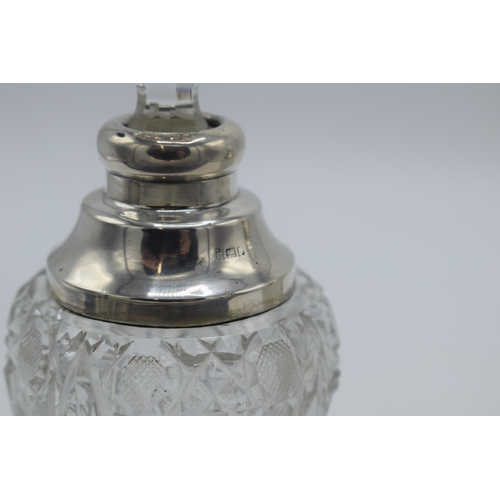 172 - A near pair of silver and cut glass perfume bottles, one London 1904, the other London 1926, both by... 