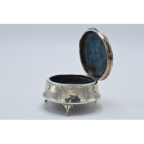 173 - Silver trinket box with velvet lining, Chester 1916, raised on three feet, 7.5cm diameter.