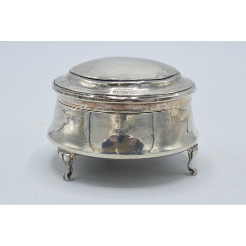 173 - Silver trinket box with velvet lining, Chester 1916, raised on three feet, 7.5cm diameter.