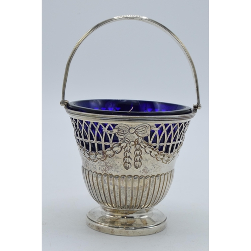 175 - Silver sugar basket with blue glass liner, London 1896 'CR', 100.4 grams, 12.5cm tall.