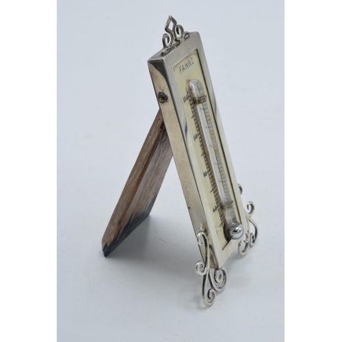 177 - Silver easel-back thermometer with ornate supports, Birmingham 1922 'LE', 10cm tall.