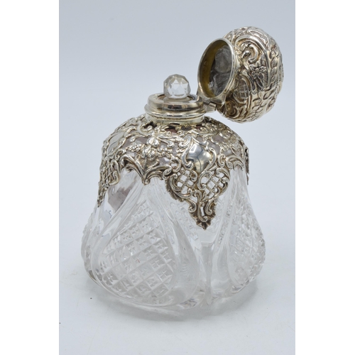 182 - Victorian silver topped perfume bottle with silver shoulder ornate decoration, Birmingham 1898, S W ... 