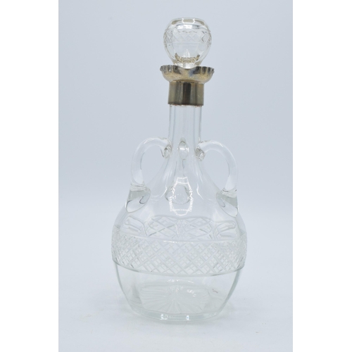 185 - Victorian glass decanter with silver collar with three handles, Sheffield 1899, 23cm tall.