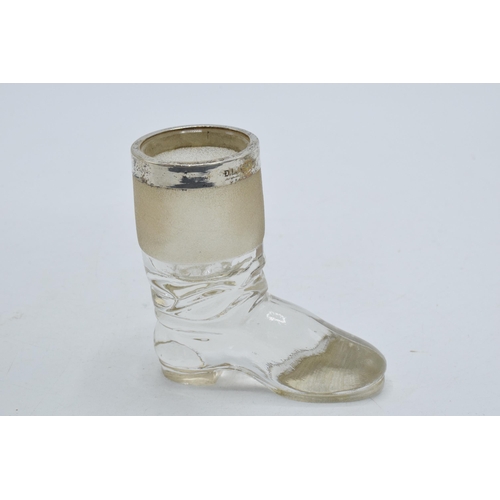 188 - Novelty match striker in the form of a boot with a silver collar, hallmarks rubbed, 6.5cm tall.