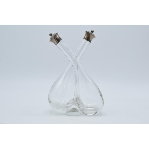 191 - Double oil condiment bottle with silver tops, Birmingham 1906, W Hutton & Sons, 17cm tall.