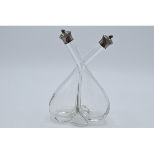 191 - Double oil condiment bottle with silver tops, Birmingham 1906, W Hutton & Sons, 17cm tall.