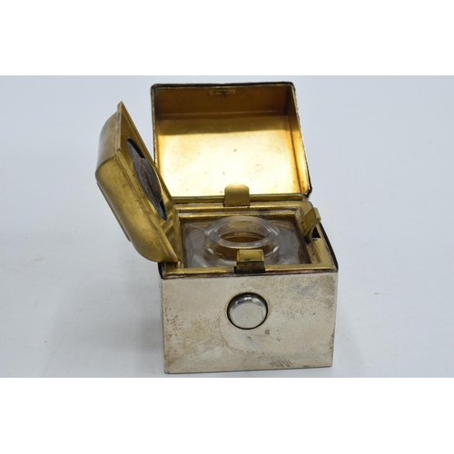 196 - Silver travelling inkwell in cube form, Birmingham 1909, GY & Co, with glass liner, 5cm tall.