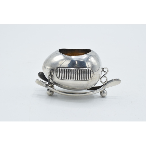 200 - Silver novelty match holder and match striker in the form of an egg sat on a wishbone, Birmingham 19... 