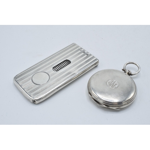 210 - A silver pocket watch case with masonic symbol to front together with a striped silver cigarette cas... 