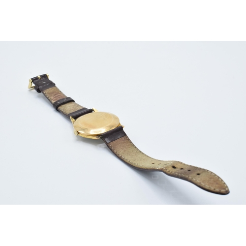 237 - Ardath 18ct gold cased gentlemans wristwatch, 34mm, in working order, on leather strap, marked to re... 