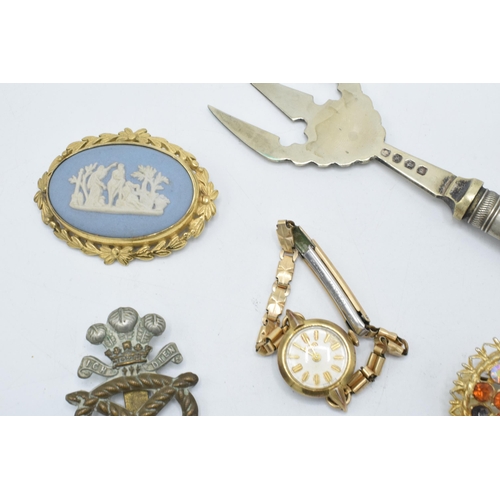 249 - A collection of items to include a plated Albertina  watch chain, a Wedgwood brooch, rolled gold wat... 