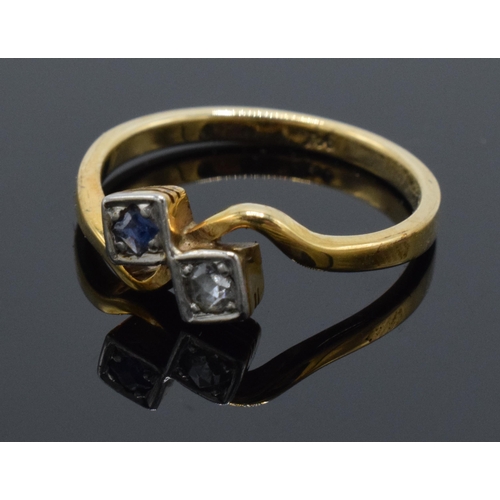 295 - 9ct gold sapphire and rose cut diamond crossover ring, size N, 2.1 grams, stamped '9ct' and tests as... 