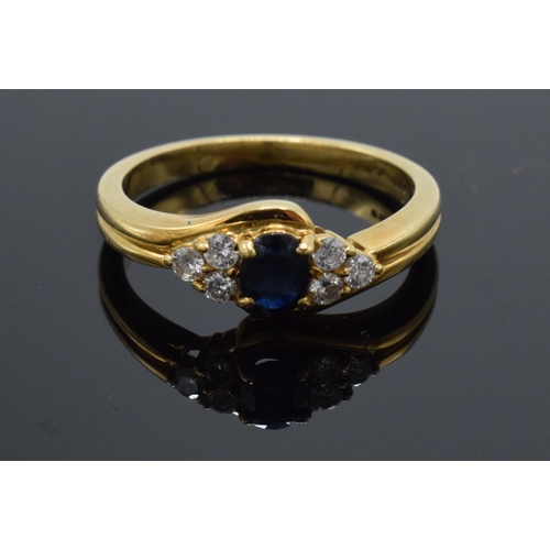 296 - 18ct gold sapphire and 6 stone diamond ring, 4.2 grams, size  P, full hallmarks.